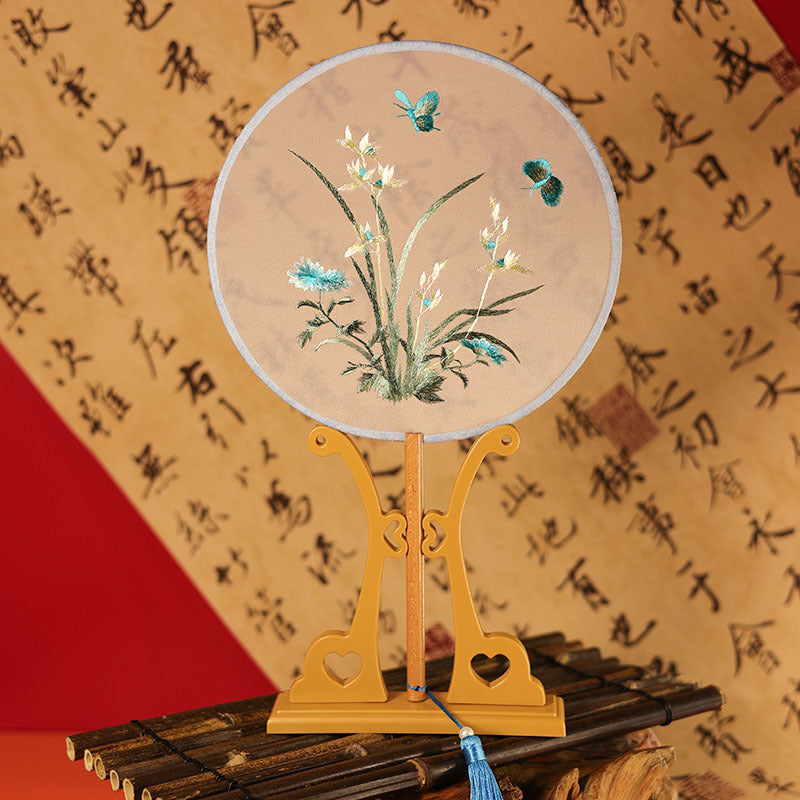 Hand-held fan with boneset flower and butterfly embroidery