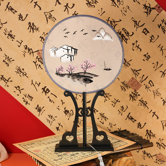 Handheld round embroidered fan with landscape pattern